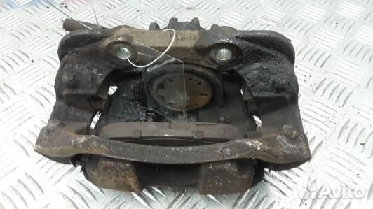 Суппорт тормозной передний левый peugeot 308 1 (SM