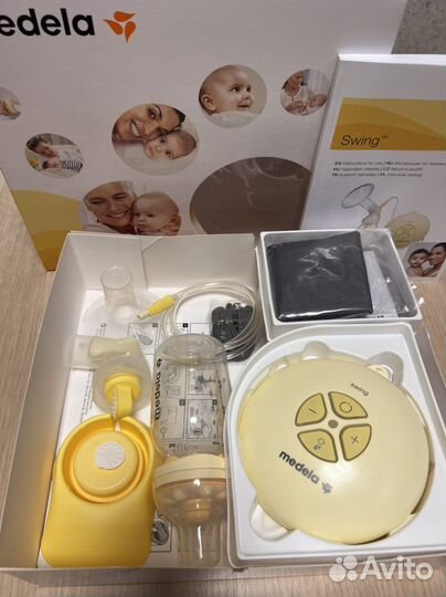 Молокоотсос medela электрический