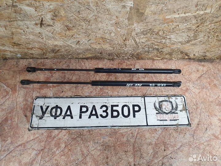 Амортизатор двери багажника Nissan Almera N16 2000