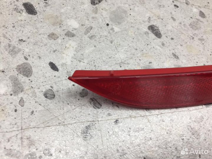 Отражатель в бампер задний левый Kia Cerato YD 201