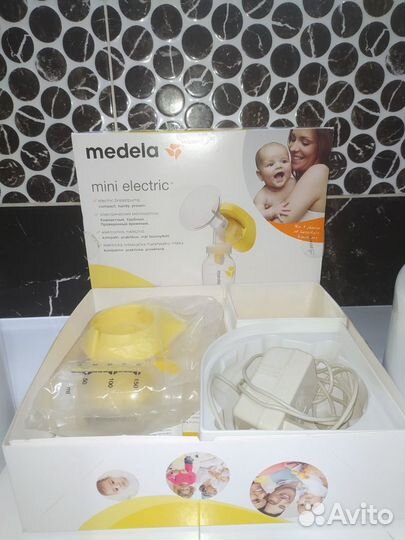 Молокоотсос medela электрический