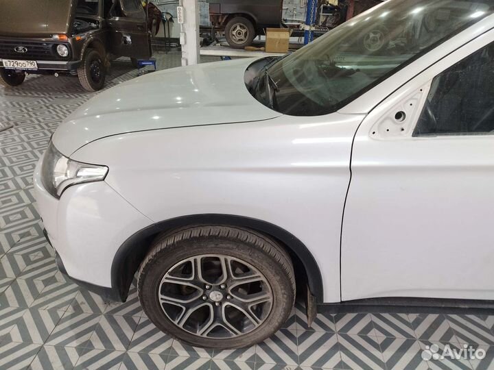 Двери и крылья Mitsubishi Outlander