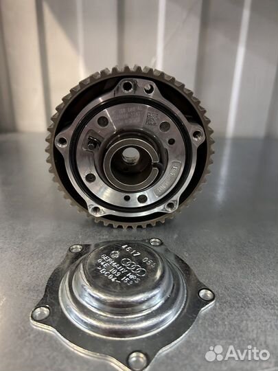 Регулятор фаз газораспределения 04Е109088ае