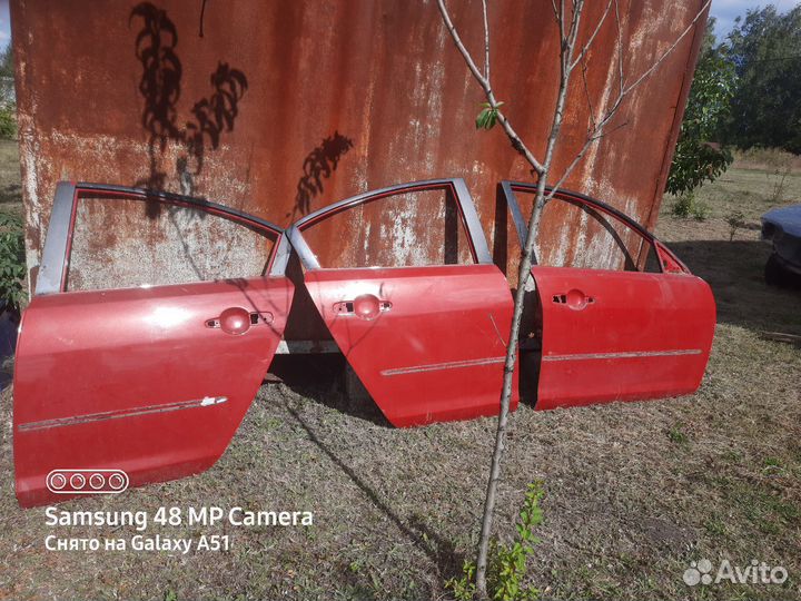 Двери mazda 3 bk