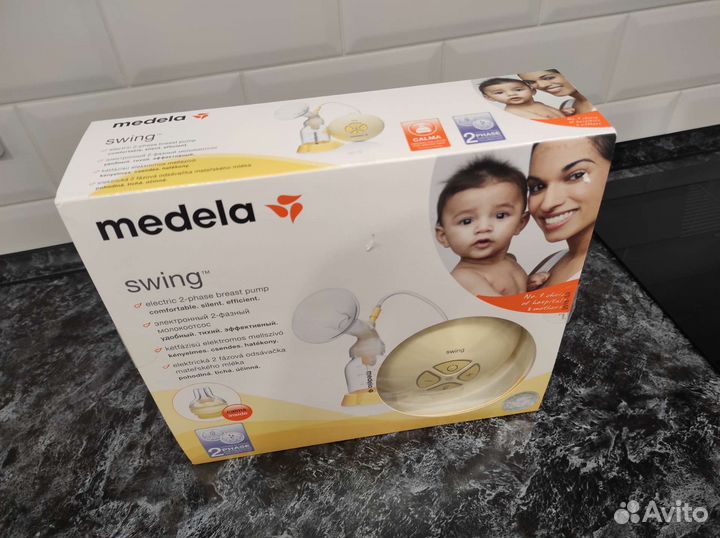 Молокоотсос medela swing электрический