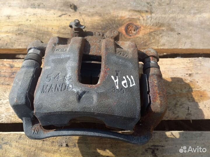 Суппорт передний правый kia rio 4