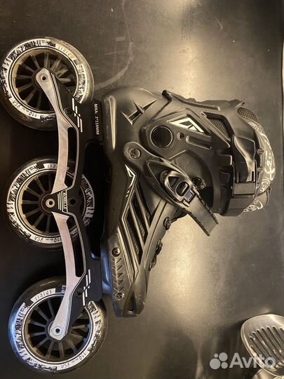 Роликовые коньки