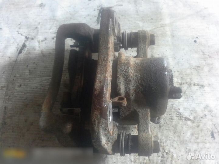 Суппорт задний правый Hyundai Tucson 2004-2010