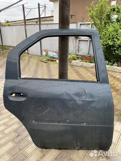 Дверь renault logan