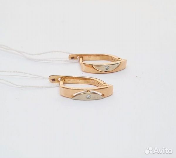 Золотые серьги с камнем