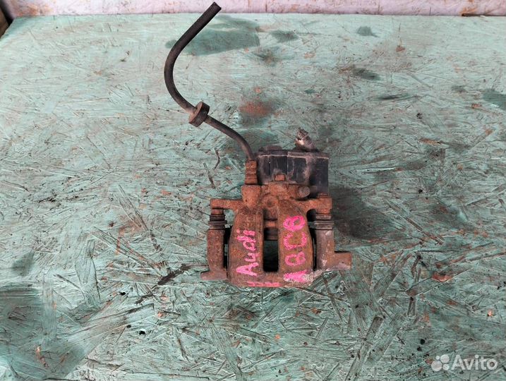 Суппорт задний правый AudiA6C6