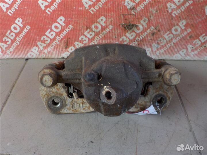 Суппорт тормозной передний левый Kia Spectra