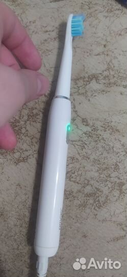 Электронная зубная щетка