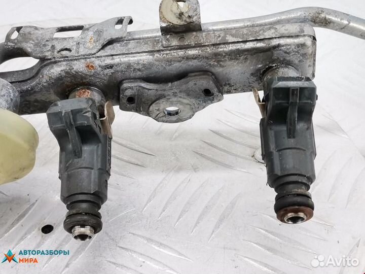 Форсунка Honda Jazz рест. 2007 16450pweg01