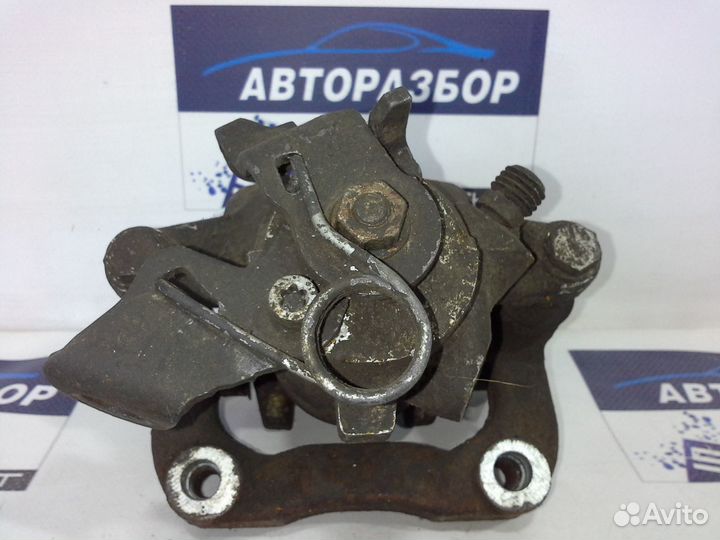 Суппорт тормозной задний Peugeot 308 Пежо