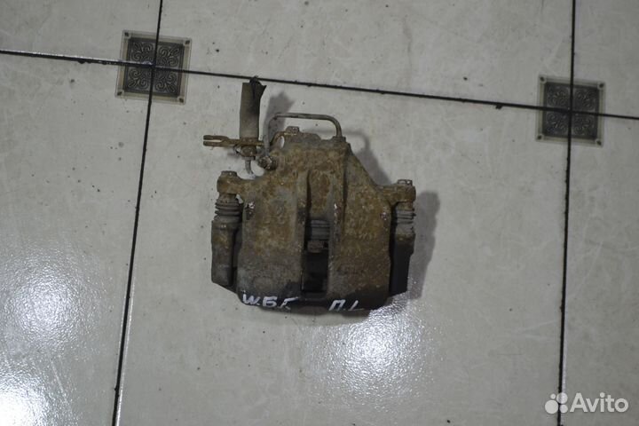 Тормозной суппорт перед лев Volkswagen Passat B5