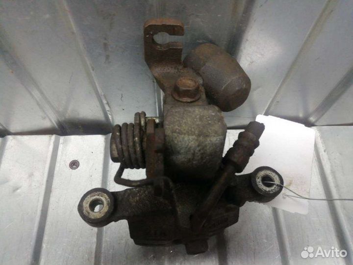 Суппорт тормозной задний правый Kia Picanto 1