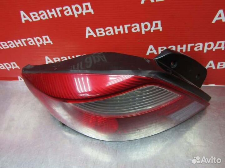 Фонарь левый Kia Rio DC 2001