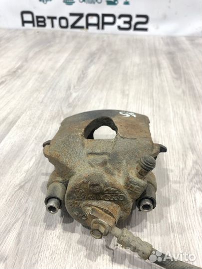 Суппорт тормозной передний правый Skoda Octavia A5