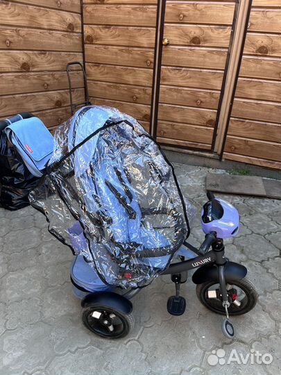 Трехколесный велосипед с ручкой