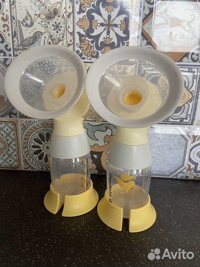 Молокоотсос medela swing flex электрический