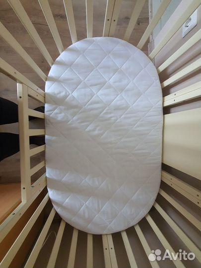 Детская кроватка с маятником круглая