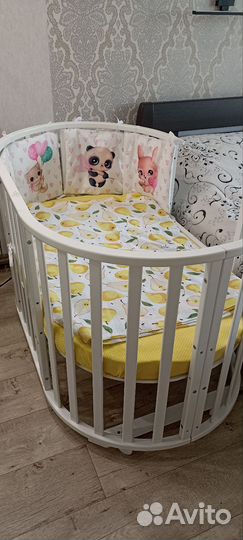 Детская кроватка с маятником круглая