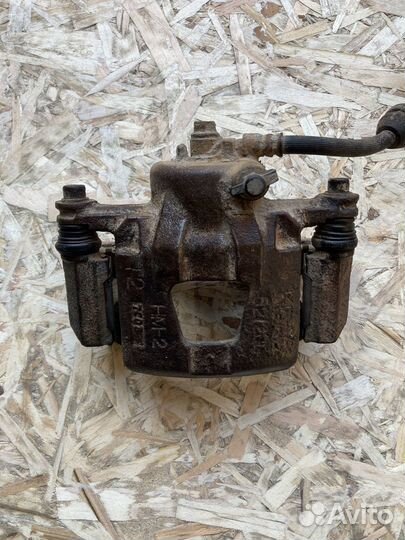 Суппорт передний левый Chevrolet Aveo T250 Разбор