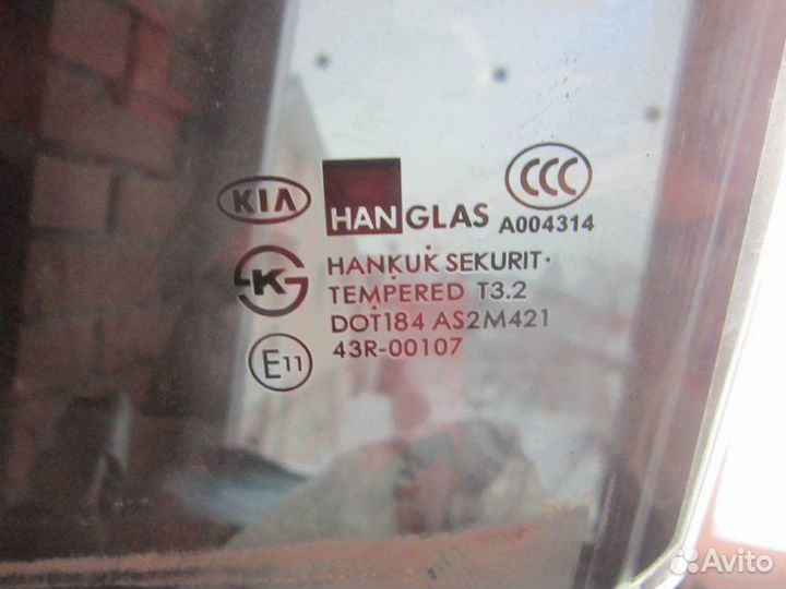 Стекло двери задней левой Kia Spectra
