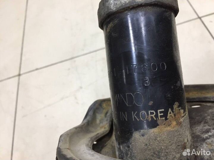 Амортизатор передний левый