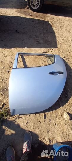 Дверь задняя левая Mitsubishi L200