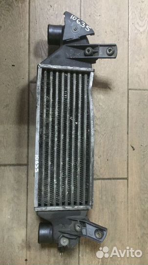 Интеркулер Ford Focus 1998 XS4Q-9L440-BD