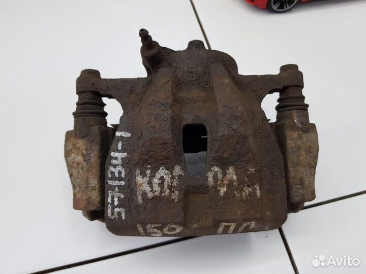 Суппорт передний правый (Toyota Corolla)