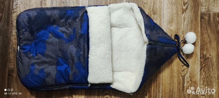 Зимний конверт в коляску на овчине