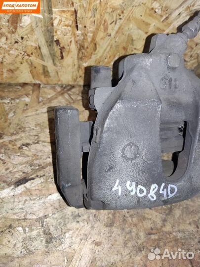 Суппорт тормозной передний левый Mazda 3 BL