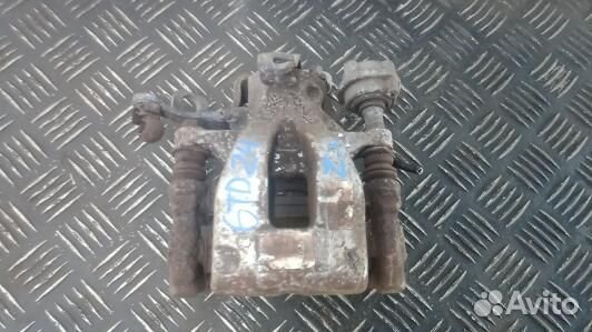 Суппорт тормозной задний левый volkswagen jetta 6 (6TD05LS01)