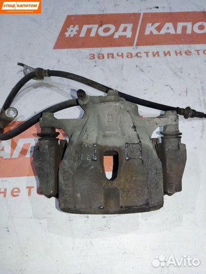 Суппорт тормозной передний правый Toyota Corolla