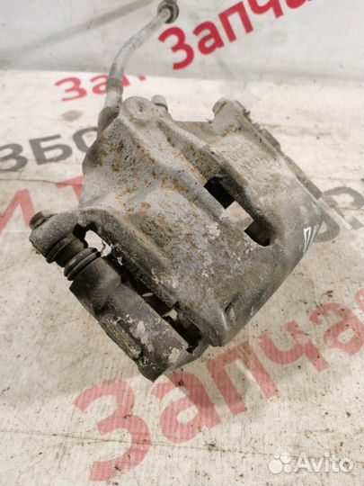 Суппорт тормозной передний левый Ford Mondeo седан