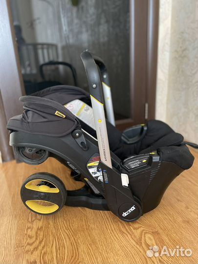 Коляска автолюлька doona