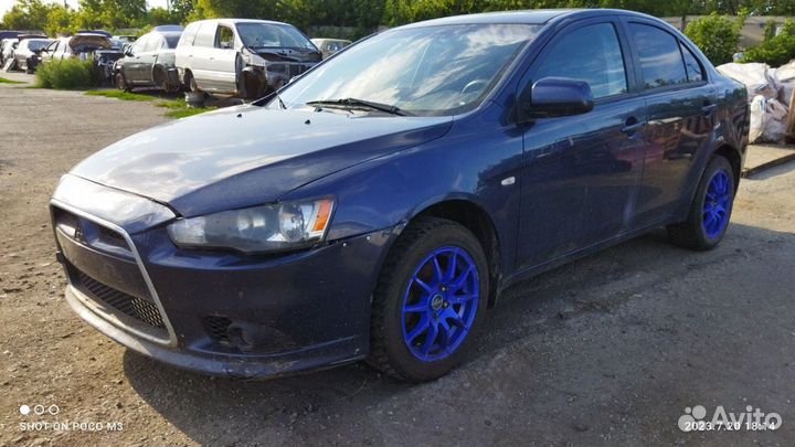 Компрессор кондиционера Mitsubishi Lancer 10