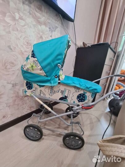 Коляска кукольная