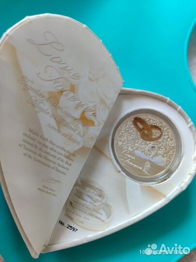 Серебряная монета подарочная