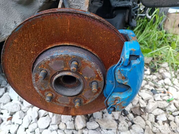 Суппорт тормозной передний Ford Torneo connect