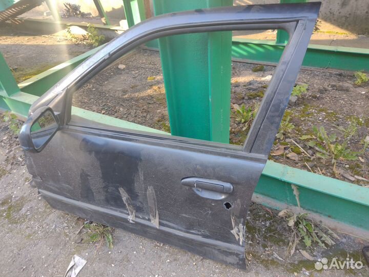Дверь водительская Nissan Primera P11