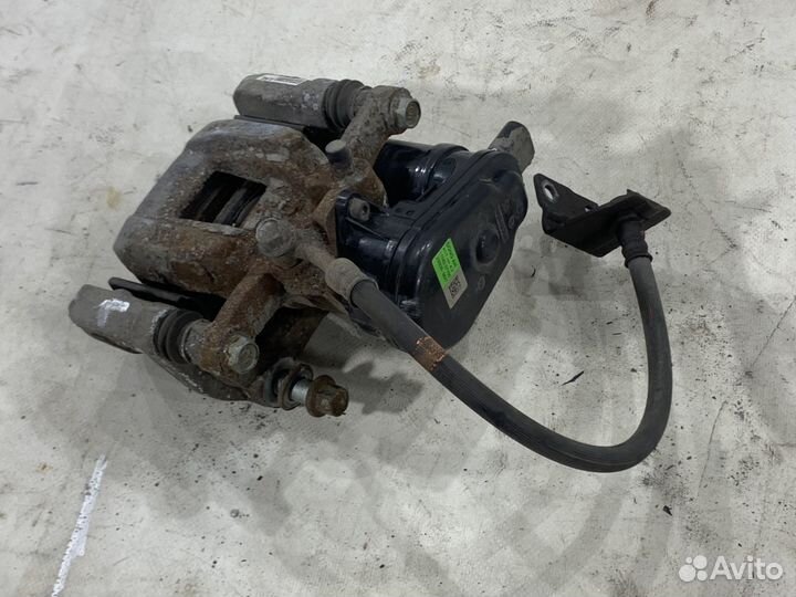 Суппорт тормозной задний левый KIA K5 DL3