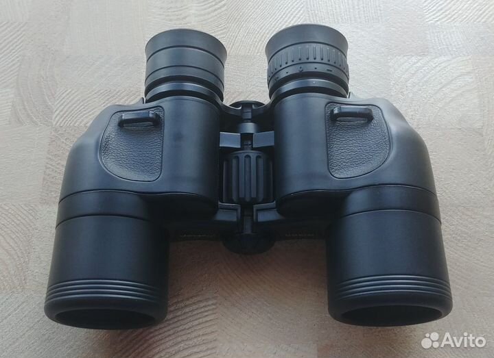 Бинокль Nikon Olympus