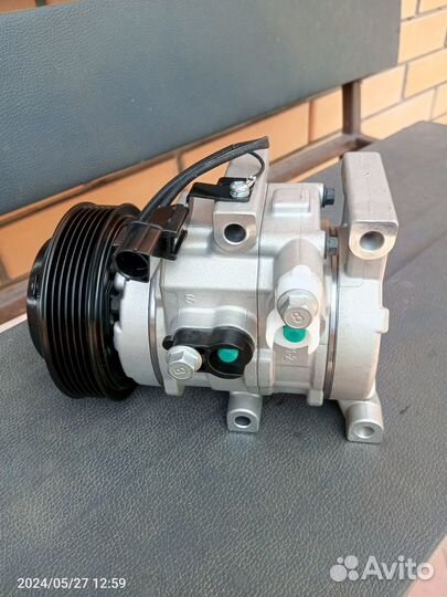 Компрессор кондиционера Kia Rio 3