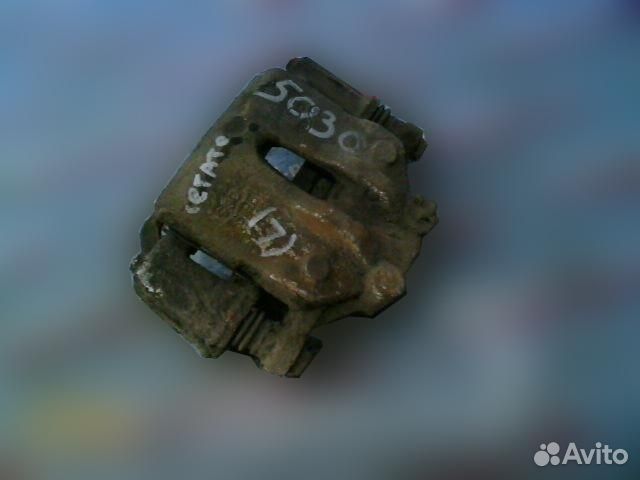 Суппорт передний левый Kia Cerato 2009-2013