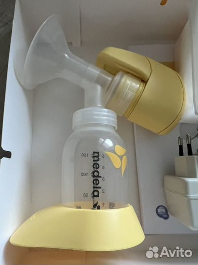 Молокоотсос medela электрический