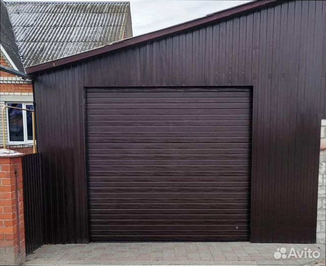 Высокие секционные ворота под ключ